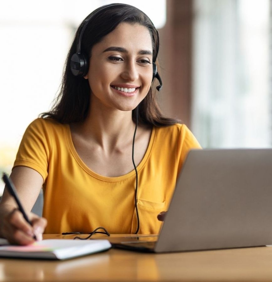 Woman With a Headset, Taking Online Driver's Ed in San Antonio<br />
